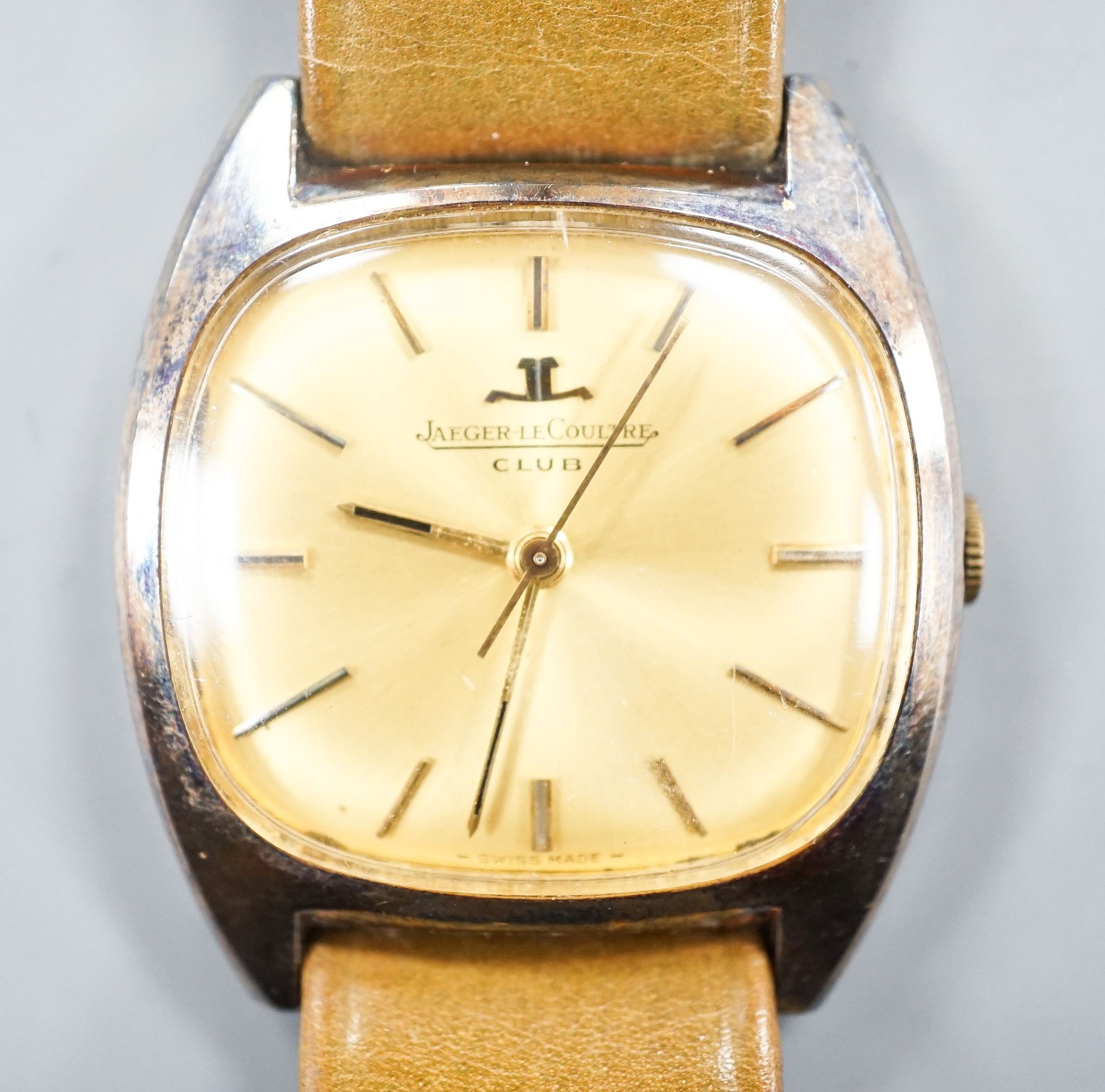 A gentleman's stainless steel Jaeger LeCoultre Club manual wind wrist watch, on associated strap, case diameter 32mm.